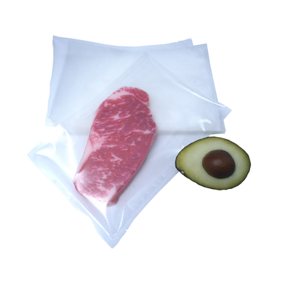 Il chiaro nylon di plastica della borsa di vuoto del grado di imballaggio per alimenti insacca la borsa del sigillatore di vuoto di alta qualità per alimento